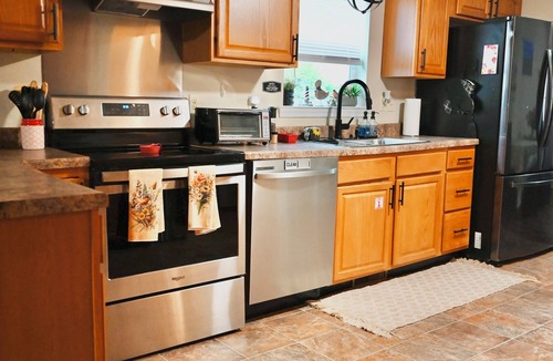Williamsport Cottage | Enjoy Fall on our big porch! Check out discounts, bike storage and amenities!