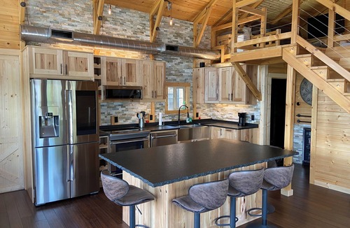 Williamstown Cabin | Epic Family Lake Getaway - 5 Min to Ark, Gameroom, 100ft Dock, Hot Tub, Sauna