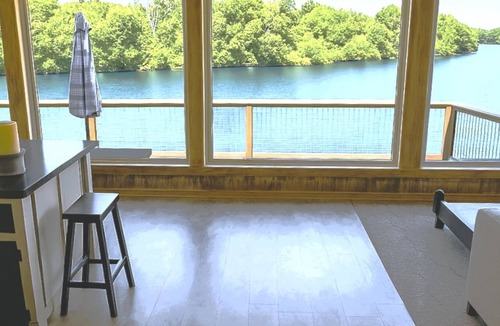 Cave Spring House | Escape to Tranquil Waters, where comfort meets calm. Enjoy serene river views and waterfront access, inviting spaces, and the perfect backdrop for rest, romance, or family fun. Boat Rental and Fishing Charters available anytime of the year.