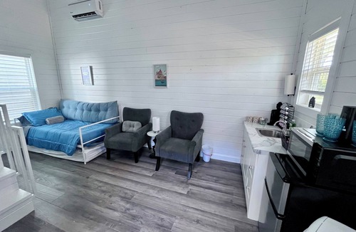 Cape Girardeau Cottage | European Inspired Lofted Cottage in Tiny Home Village