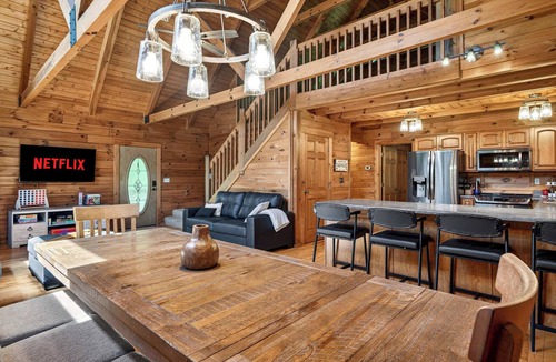 Leitchfield House | Expansive lakefront cabin with game room and yard!