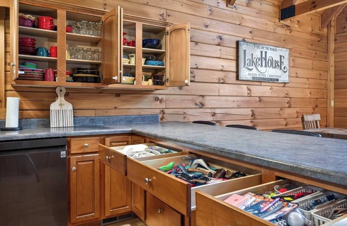 Leitchfield House | Expansive lakefront cabin with game room and yard!