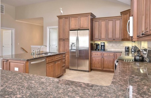 Yaupon Beach House | Experience beachfront bliss at Incommunicado, a spacious 4-bedroom home in Oak Island.