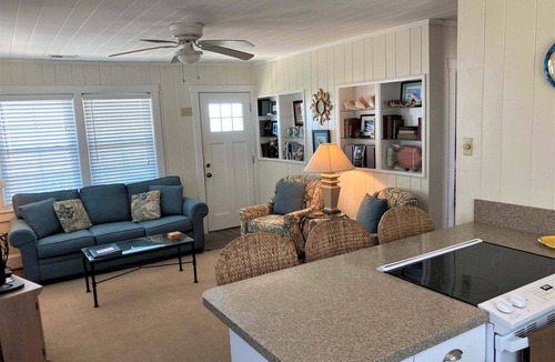 Holden Beach House | Experience bliss at Coast 'N Along, a spacious 3-bedroom retreat in Holden Beach.