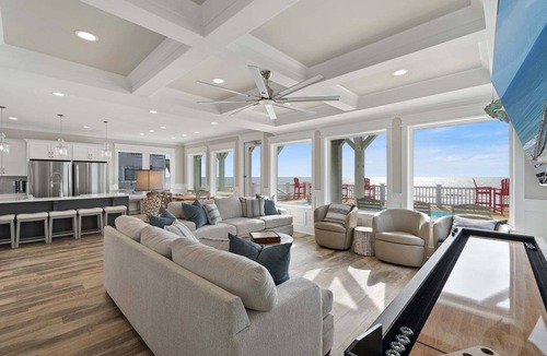 Oak Island House | Experience luxury at '7 Day Weekend,' an oceanfront 7-bedroom retreat in Oak Island.
