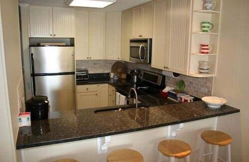 Holden Beach House | Experience oceanfront bliss at Next 2 Paradise, a cozy 2BR condo in Holden Beach.