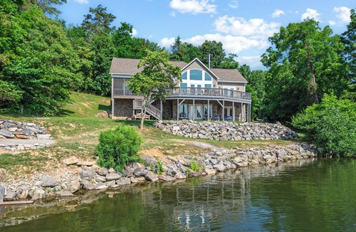 Dublin House | Experience the perfect blend of rustic charm and modern luxury in this Claytor lakefront retreat
