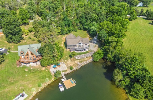 Dublin House | Experience the perfect blend of rustic charm and modern luxury in this Claytor lakefront retreat