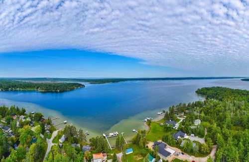 Indian River House | Fall Hikes & Fire Pit: Pet-Friendly MI Retreat