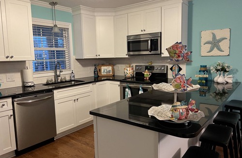 Sunset Beach House | Family and fun awaits you at our Tee Time Sunset Beach house!