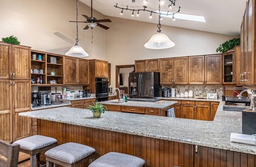 Terry Sanford House | Fayetteville Getaway | Pool Pizza Oven Fire Pit