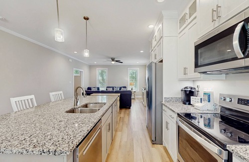 Morehead City House | Four townhomes - heart of the city - elevator, balconies, fast WiFi, central AC