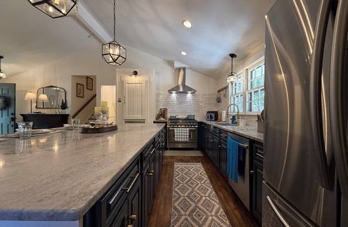 Raleigh House | French Country Retreat in North Hills, Fenced Yard, Game Room