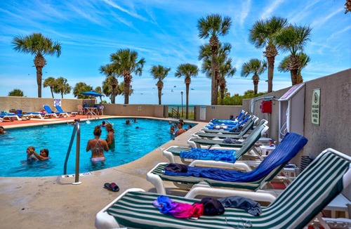 Myrtle Beach House | Gorgeous views and custom decor and affordable pools hot tub sauna