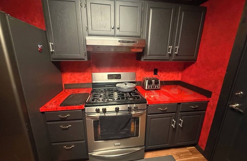 Mansfield House | Gothic Manor. Private home. Whole house. 2-bedroom home with AC and laundry