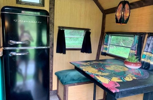 Monticello RV Rental | Groovy Vintage RV In the Woods
