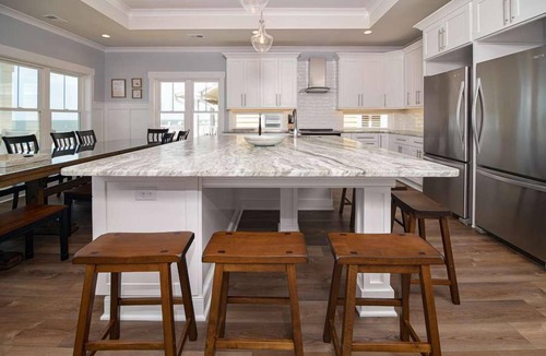 Holden Beach House | Hobbs Realty - Glad you're "Knot At Work" in this oceanfront home with a heatable pool and elevator