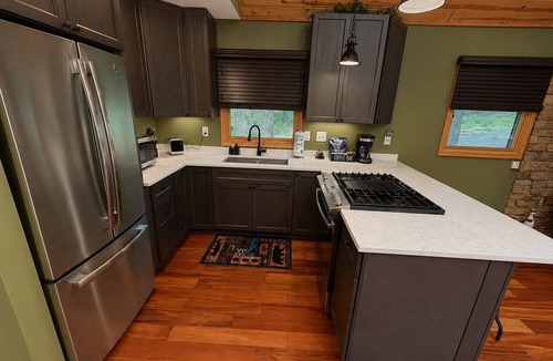 Baker Cabin | Honey Hideaway cabin on 2.5 acres fire pit outdoor workout Family Pets Welcome