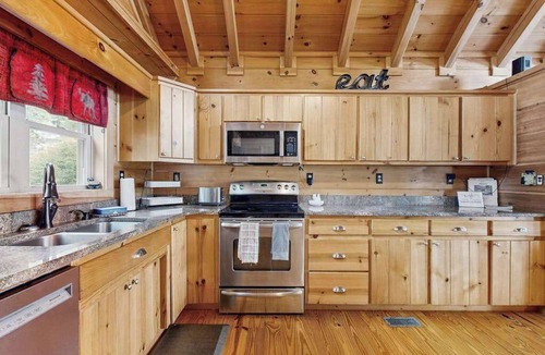 Mills River House | Lakefront Blue Ridge Cabin: balcony, firepit, wet bar, washer/dryer, dock, & AC