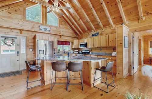 Mills River House | Lakefront Blue Ridge Cabin: balcony, firepit, wet bar, washer/dryer, dock, & AC