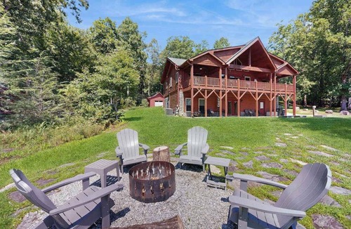 Mills River House | Lakefront Blue Ridge Cabin: balcony, firepit, wet bar, washer/dryer, dock, & AC