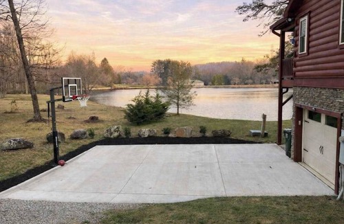 Mills River House | Lakefront Cabin & Cozy Lakeview Cottage: firepit, wet bar, dock