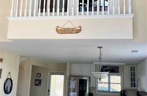 La Follette Condo | LAKEFRONT Deerfield condo on Norris FIRST ROW steps to covered boat slip & pool