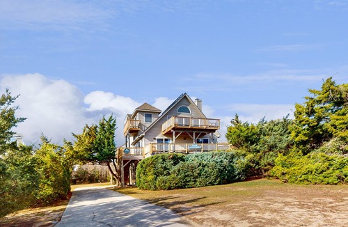 Waves House | Lakefront dog-friendly home w/private hot tub, fireplace, outdoor pool & tennis