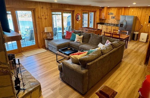 Six Mile House | Lakefront house with multiple outdoor areas, fire pit, dock and two kayaks