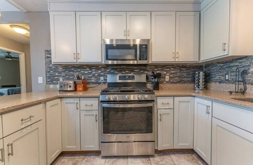 Goodview House | Lakefront Retreat with Game Room, Hot Tub, and Gym!