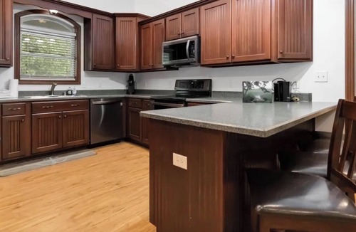 Sloans Valley House | Lakeside Hideaway 5BR lakefront home with hot tub, pools, pickleball, boat ramp