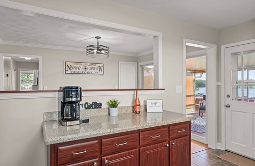 High Point House | Lakeside Oasis 3 miles to HPU- Walk to Marina, Golf, Tennis. 180° Water Views