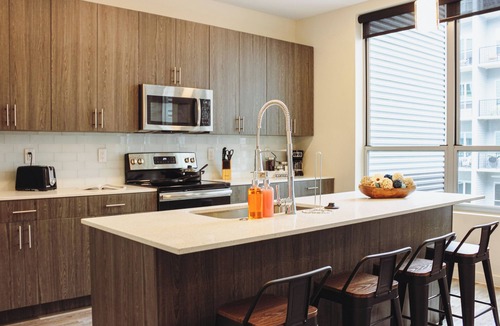 Downtown Louisville Apartment | Lavish Apartment in the Heart of Louisville! Pool, Hot Tub, Gym, & Virtual Golf!