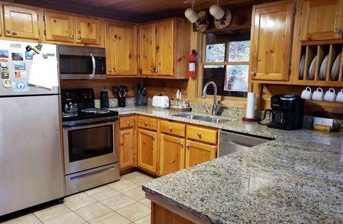 Pigeon Forge Cabin | Log Cabin Sleeps Nine-Convenient to Attractions-Easy Access- Private Hot Tub