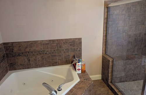 Millers House | Luxury Master Suite - 2 Private Sleeping Areas Jetted Tub Theater Room Gym