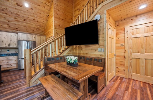 Union Hall Cabin | Main Channel Lots of Water-All Decked Out — new lakefront log home on Smith Mountain Lake with a private hot tub, 50+ ft of wraparound deck, fire pit patio & easy lake access. Two full kitchens. One of 5 cabins on an 8-acre lakefront micro-resort.