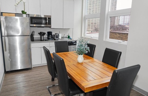 Near South Side Apartment | McCormick Place 2BR Oasis with Optional Parking, Patio, Gym for up to 6 guests Near Museum Campus, Grant Park & Soldier Field
