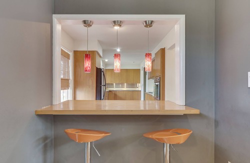 Greenfield House | Mid-century modern home with dream patio & pool