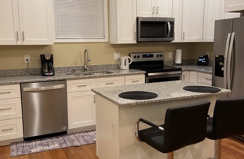 East Durham House | Modern 3-bedroom house, TV each room,big fence yard, Pet stay free, Lighted Deck