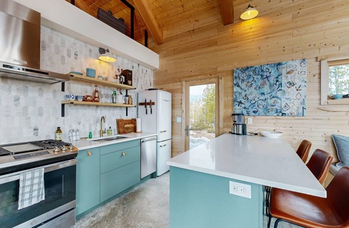 Winter Park Highlands Cabin | Modern off grid cabin with stocked kitchen & private mountain view- dog friendly