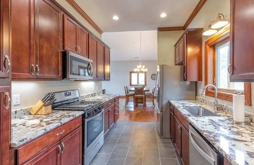 Whittier House | Mountain view condo in Country Club - fireplace & on-site hot tub, pool, tennis