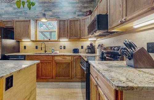 Webster House | Mountain view home with a large patio and private hot tub | fire-pit | gas grill