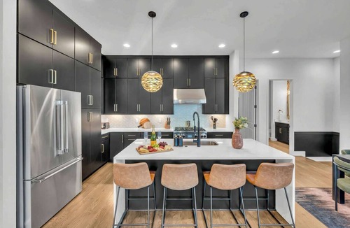 Katie Hill Neighborhood House | Nashville getaway: rooftop hot tub, game room & movie theater, sleeps 12