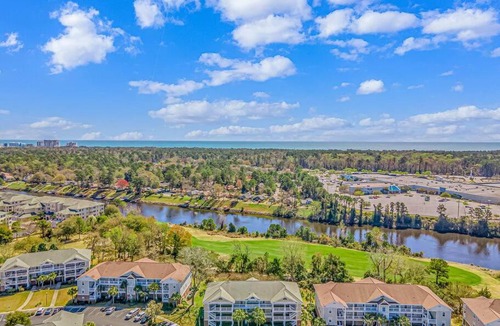 North Myrtle Beach Apartment | New! Barefoot Resort, Pools, Golf, 5 min to beach