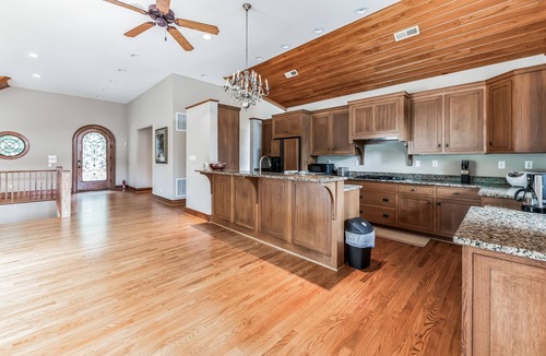 Sandston House | NEW LISTING! Hidden Waterfront Luxury Oasis with 9-Acre Pond by RedAwning