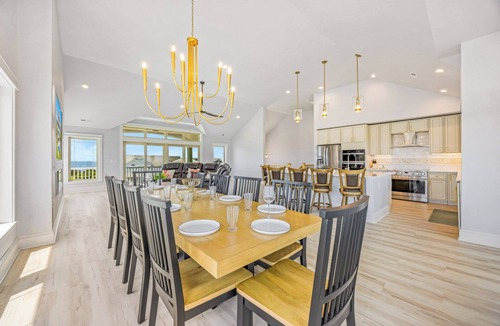 Wind Over Waves House | New Soundside Dog Friendly Avon Retreat with Pool, Hot Tub, Game Room, Theater