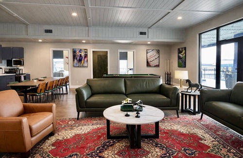 East Market District House | NuLu Skyline 5BR Penthouse and Rooftop Spa