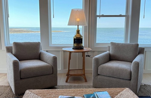 Avon Cottage | OBX Soundfront Cottage : Hot Tub, Boat Ramp, Dock, Sunsets, Complimentary Kayaks