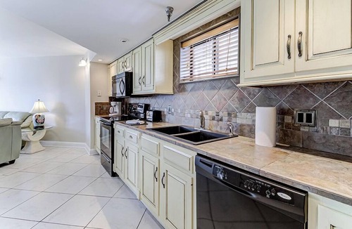 Wrightsville Beach Condo | Ocean Views, Balcony, Pool, STEPS to Beach Restaurants Shops