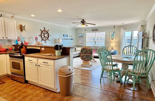 Tranquil Harbour Condo | OW 3201-Flirty Flamingo: Oceanview condo in Oak Island, sleeps 10, pet-friendly.